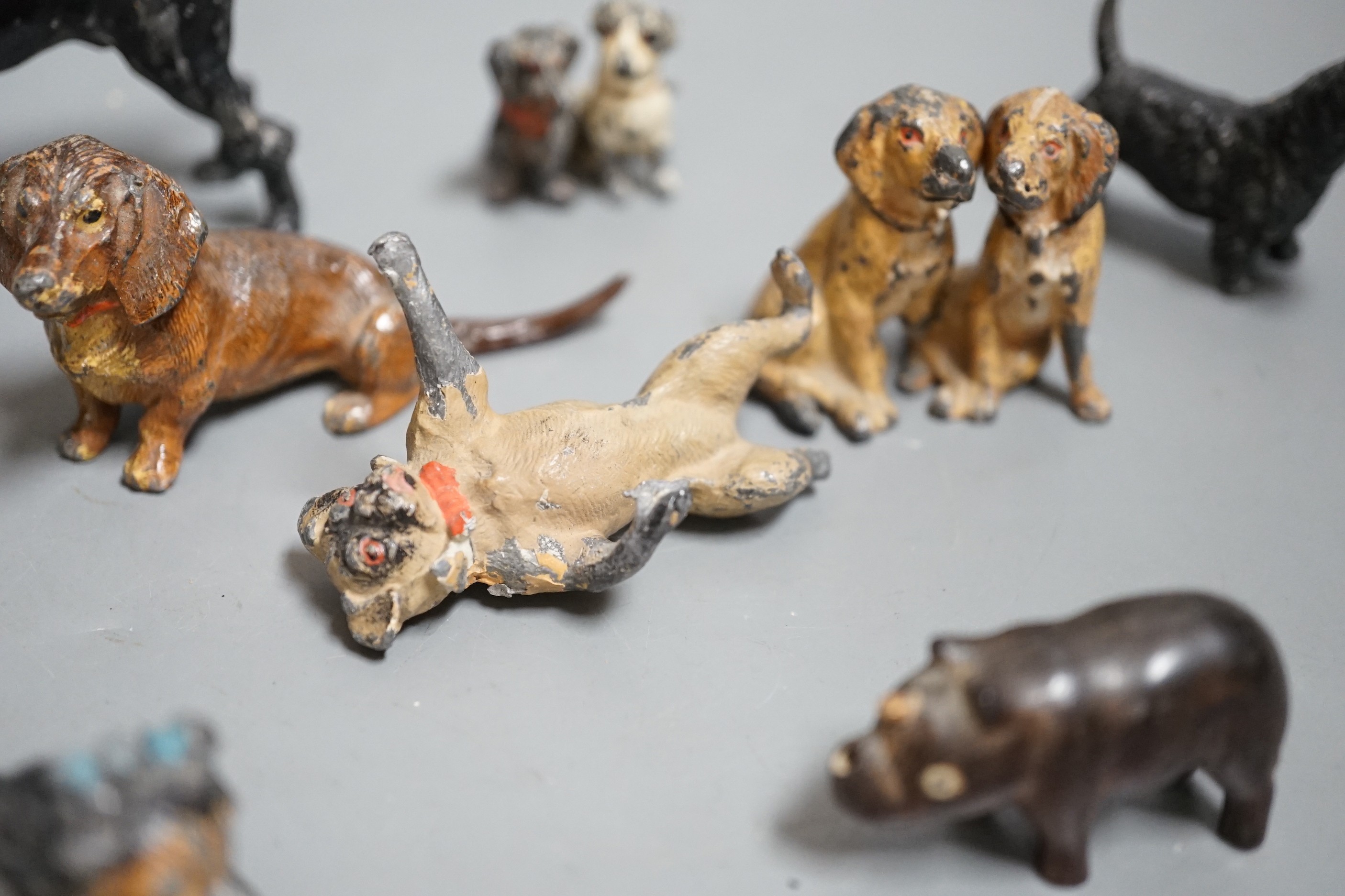 A small collection painted cast metal figures, dogs, to include ‘dancing dogs’, (group)